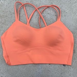 Never worn Lululemon Like a Cloud Longline Sports Bra, size 6 color sunny Coral